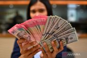 Rupiah Berada di Angka Rp17.677 per Dolar AS pada Jumat Pagi
