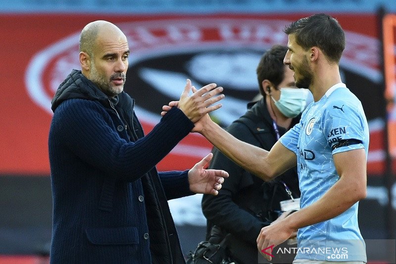 Guardiola puji duet Aymeric Laporte & Ruben Dias